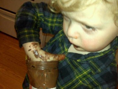 This is Oliver right before he turned 3. I had caught him Nutella-handed. He used to say, "I toes 'n tella, Mommy! I toes 'n tella!" That meant, "I want some toast with Nutella." 